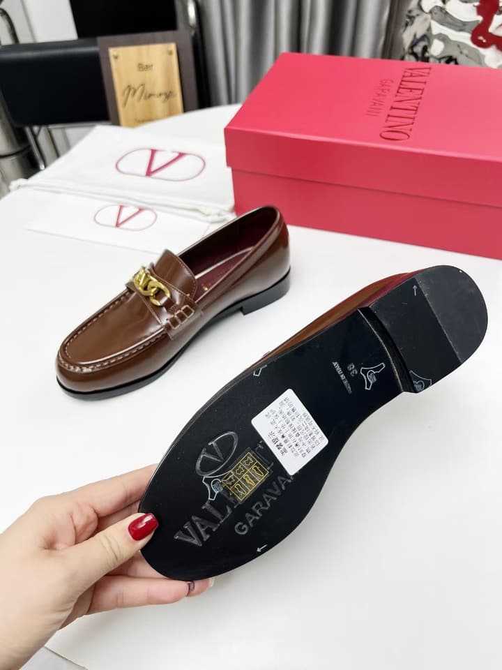 Valentino Logo Buckle Polished Leather Loafers – 2024 Collection in Black