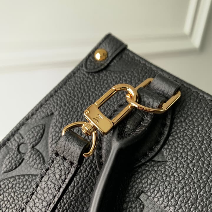 Louis Vuitton OnTheGo BB Monogram Empreinte Handbag in Beige And Cream Monogram