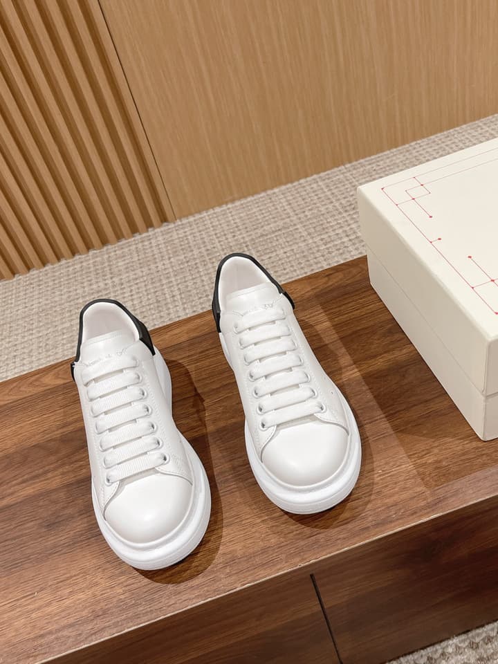 Alexander McQueen Classic Versatile White Sneakers in White With Black Laces & Heel
