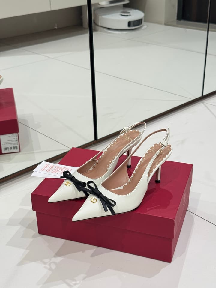 Valentino Bow-Detail High Heels in Black With White Bow