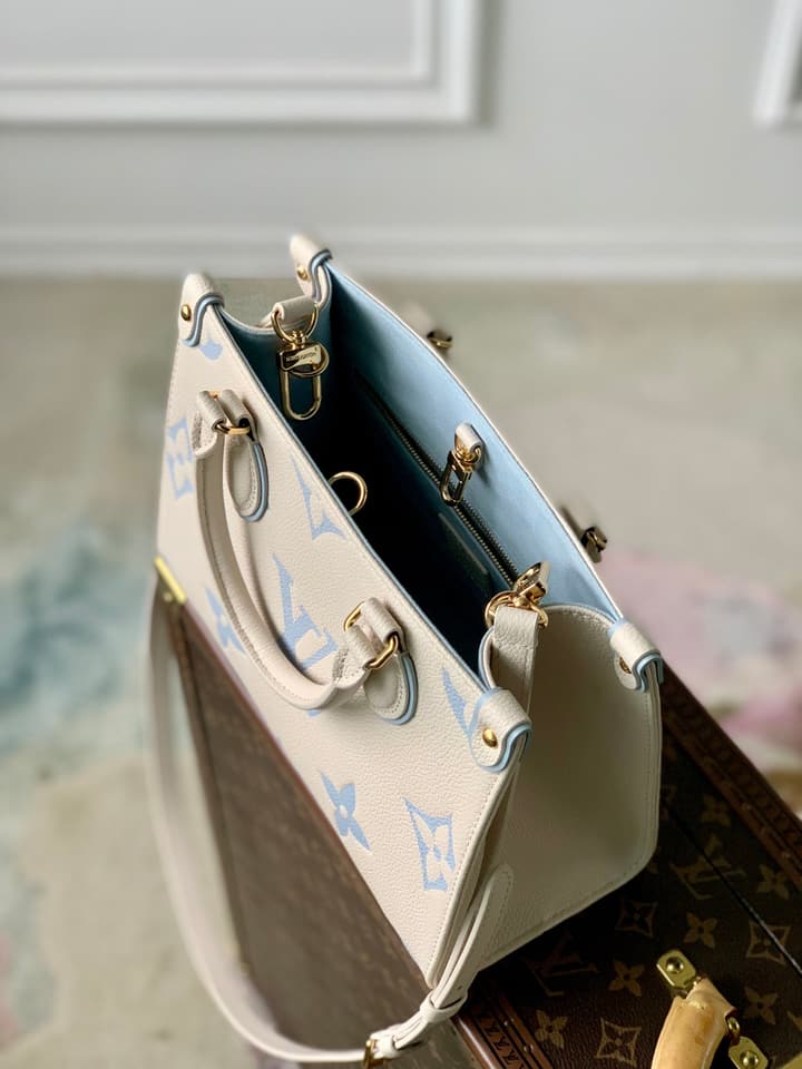 Louis Vuitton ONTHEGO Small Monogram Tote Bag in Cream With Blue Monogram