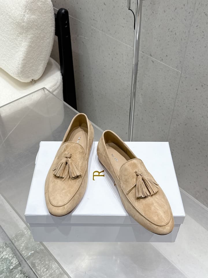 The Row Tassel Loafers in Black Suede