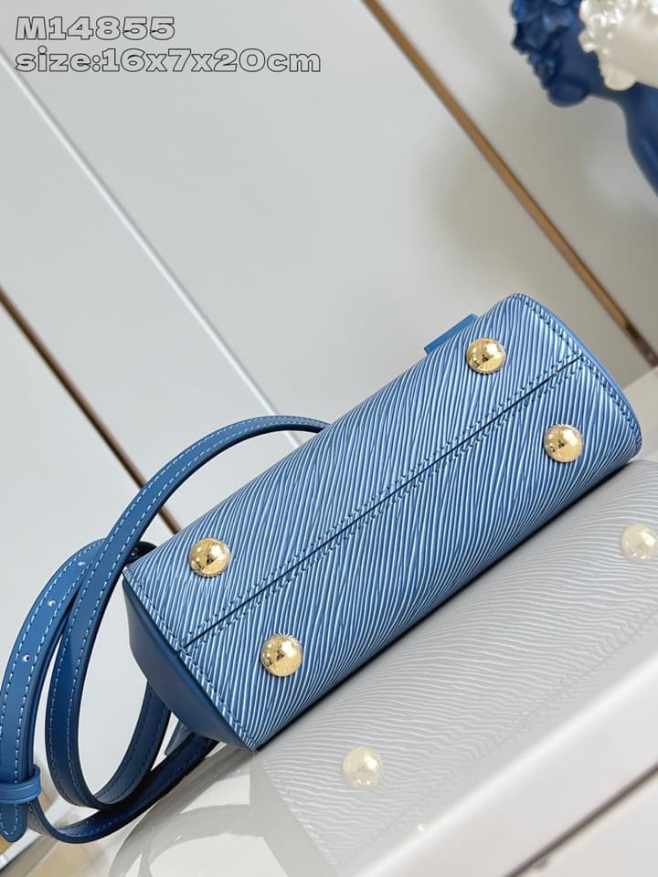 Louis Vuitton Cluny Mini Handbag in Beige