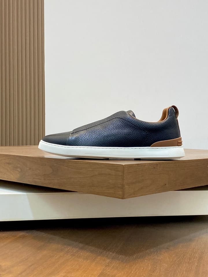 Ermenegildo Zegna Triple Stitch Sneakers in Black Leather With Brown Tag
