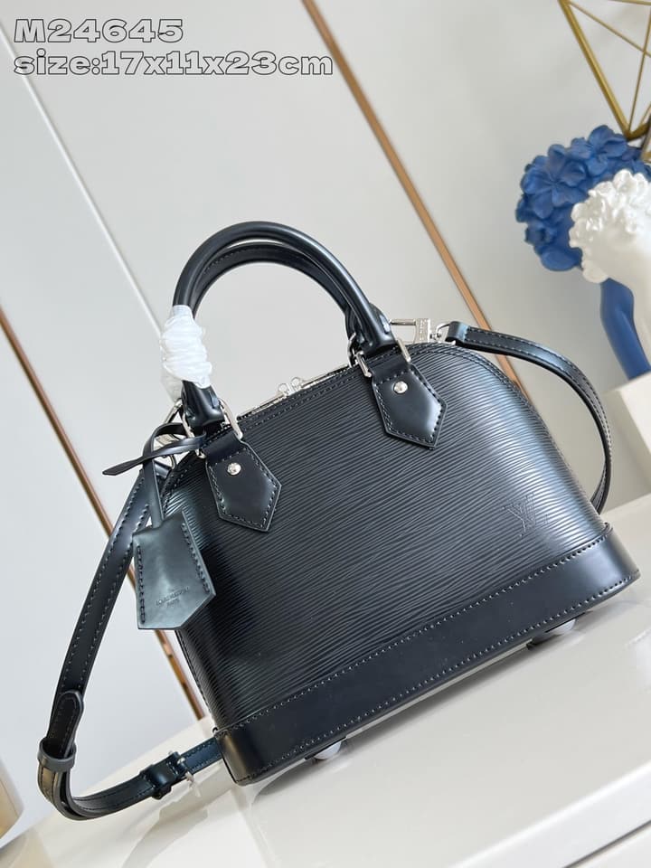 Louis Vuitton Alma BB Handbag in Beige
