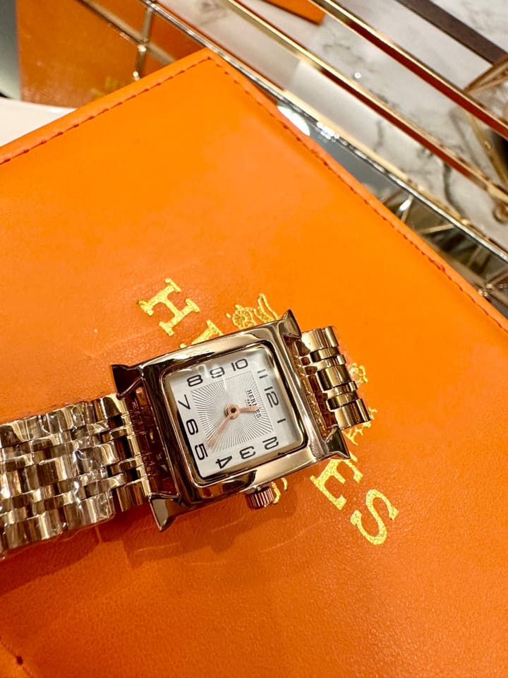 Hermès Small Square Luxury Watch in Dark Dial Patterned Gold Bracelet