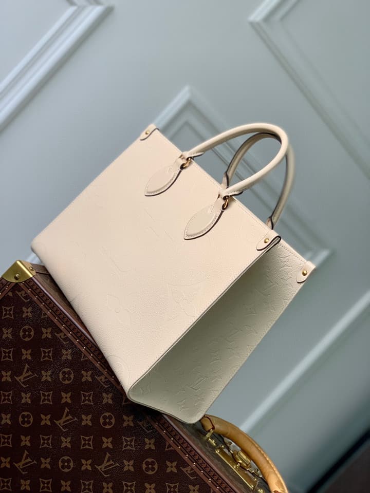 Louis Vuitton OnTheGo Medium Monogram Empreinte Tote in Cream Monogram Empreinte