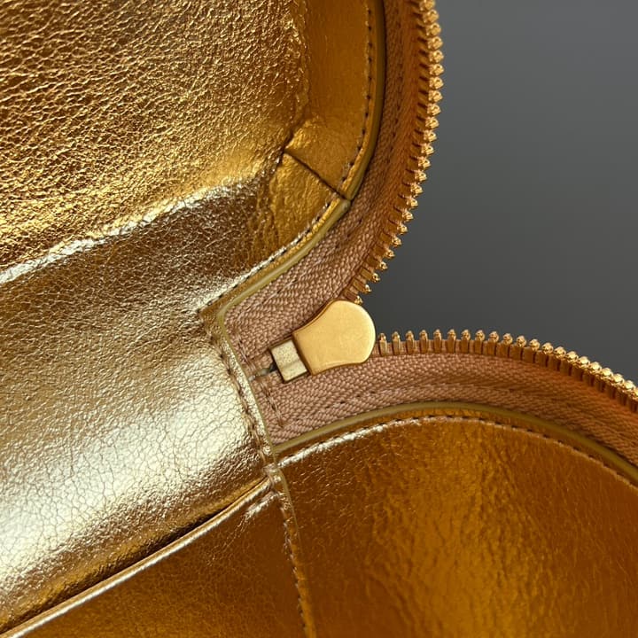 Bottega Veneta Intrecciato Vanity Case in Metallic Gold