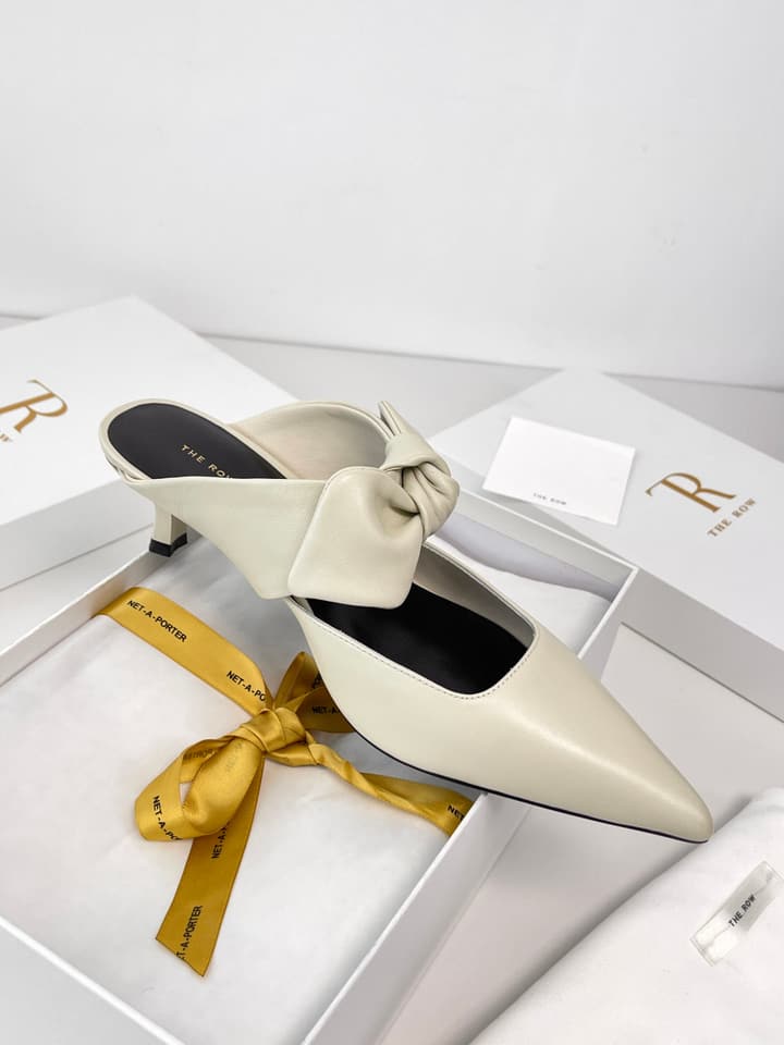 The Row Leather Bow Mules in Black Leather