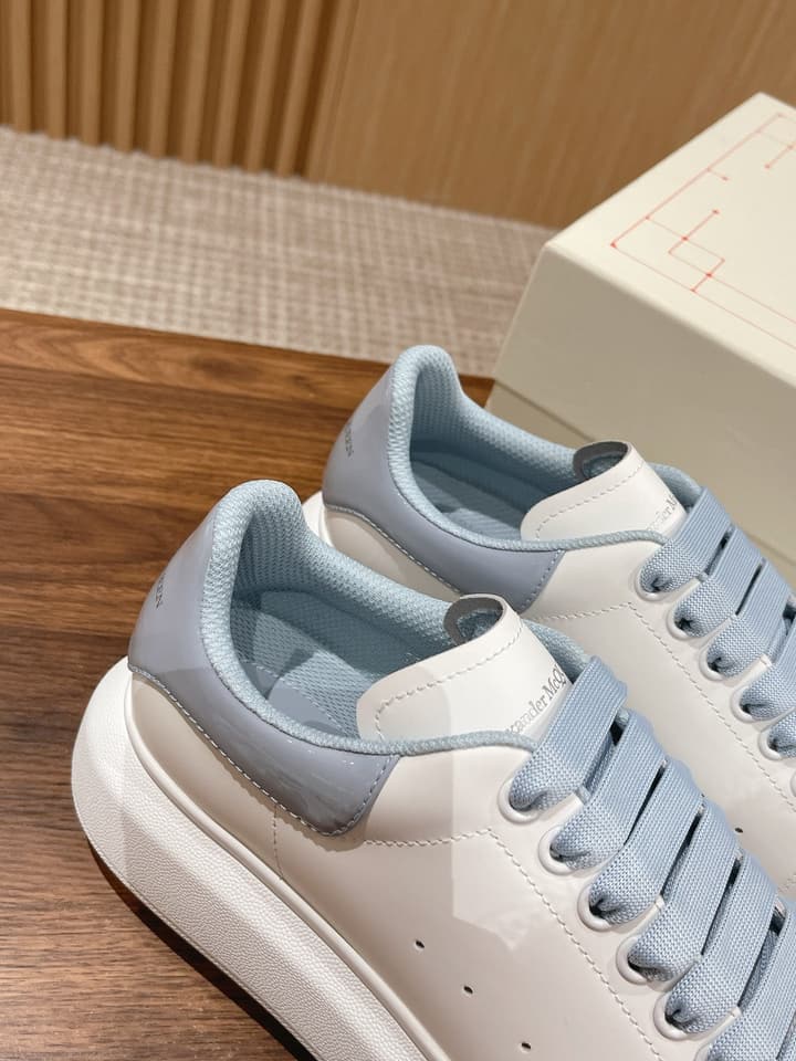 Alexander McQueen Classic Versatile White Sneakers in White With Black Laces & Heel
