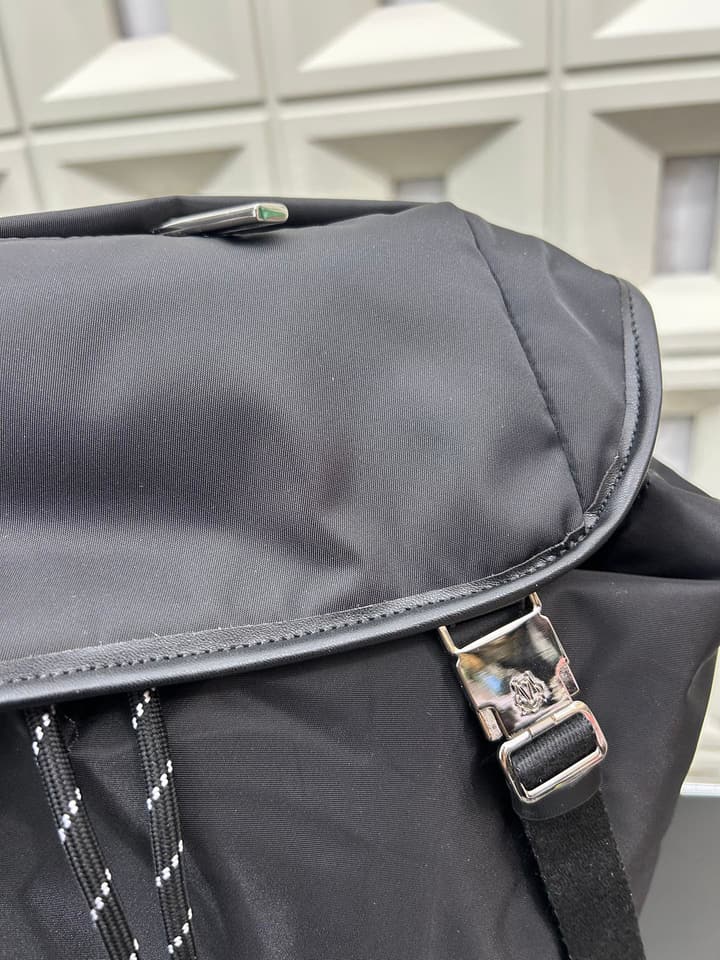RIMOWA Signature Series Flap Drawstring Backpack in Classic Black