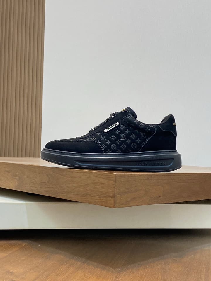 Louis Vuitton Embossed Calfskin Sneakers in Black