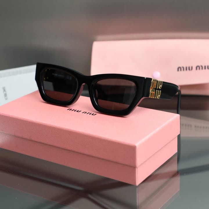 Miu Miu 2025 Cat-Eye Sunglasses – 2025 Collection in Gold