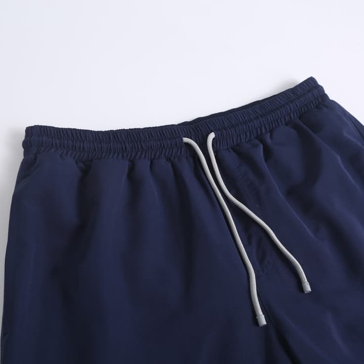 Brunello Cucinelli Embroidered Swim Trunks in Navy Blue