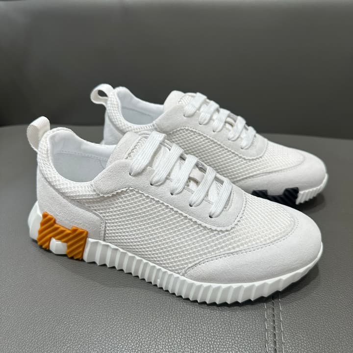 Hermès Bouncing Sneakers in Bright White With Orange H