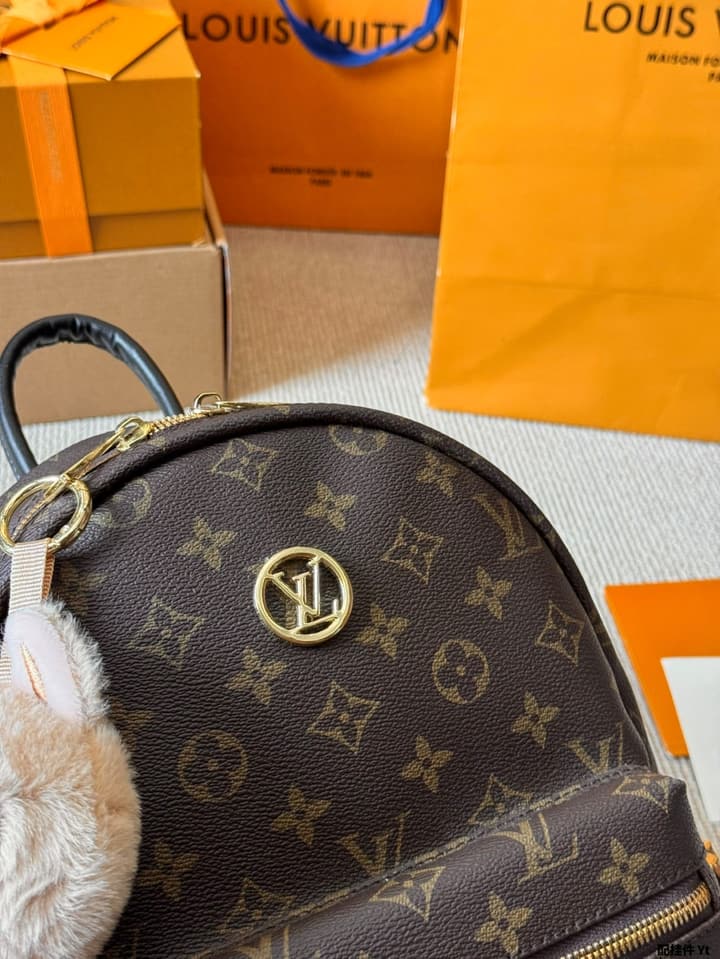 Louis Vuitton Monogram Mini Backpack in Monogram With Light Blue Charm