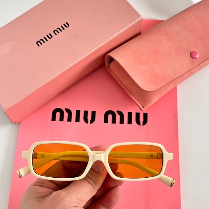 Miu Miu SMU 11Z Narrow Frame Sunglasses