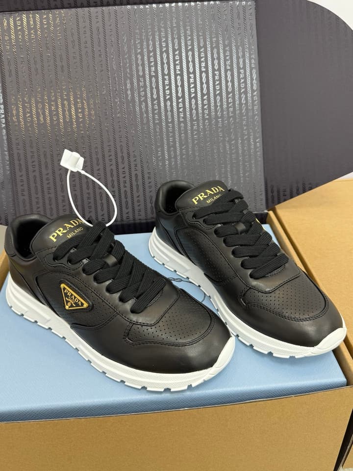 Prada Triangle Logo Sporty Sneakers – 2025 Early Autumn Collection in Black