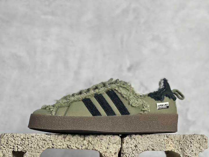 Adidas Originals x Song For The Mute Campus 80S Distressed Canvas Shell-Toe Sneakers in Distressed Olive Green 1