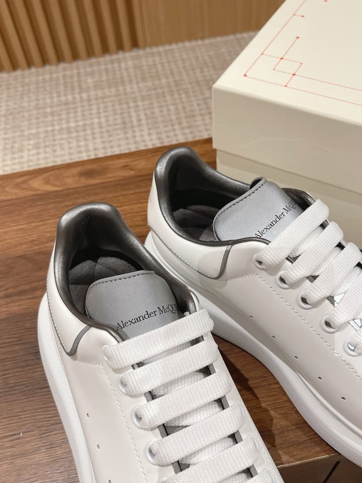 Alexander McQueen Classic Versatile White Sneakers in White With Black Laces & Heel