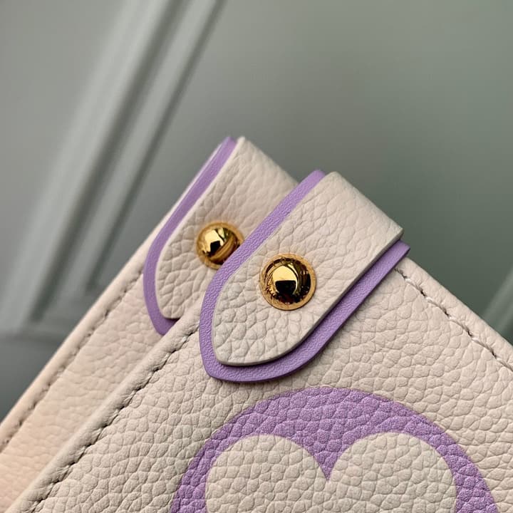Louis Vuitton ONTHEGO Medium Tote Bag in Cream/white Monogram With Lilac Print