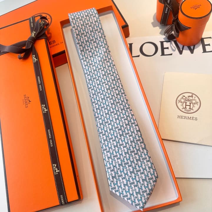 Hermès Men's Printed Silk Tie Series in Light Aqua Patterned
