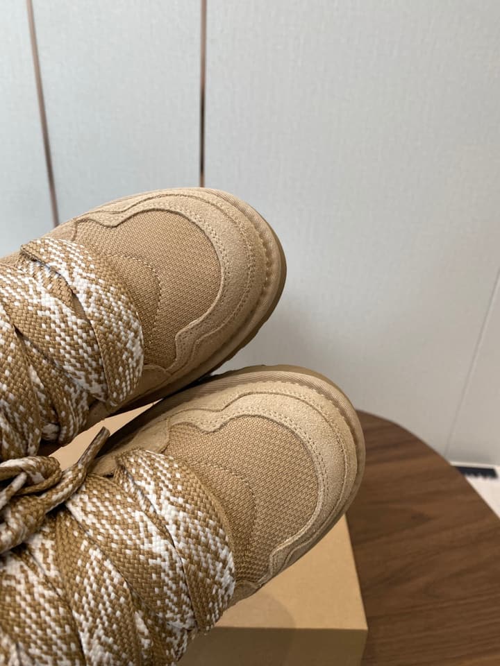 UGG Knitted Shearling Snow Boots in Black Suede