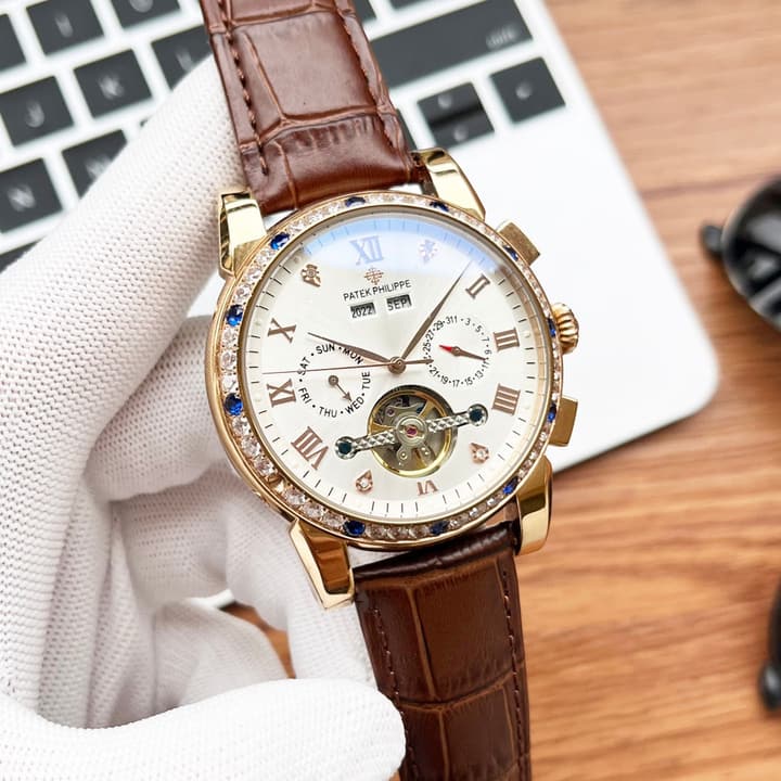 Patek Philippe Men's Automatic Watch in Gold