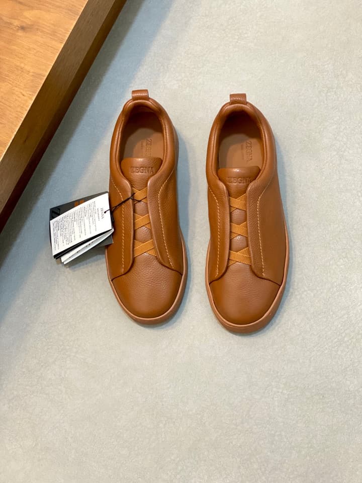 Ermenegildo Zegna Triple Stitch Sneakers in Black Leather With Brown Tag