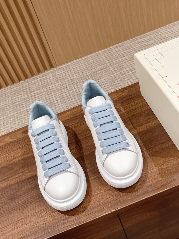 Alexander McQueen Classic Versatile White Sneakers in White With Black Laces & Heel