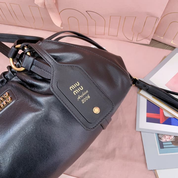 Miu Miu Tassel Drawstring Bucket Bag – New Collection in Black