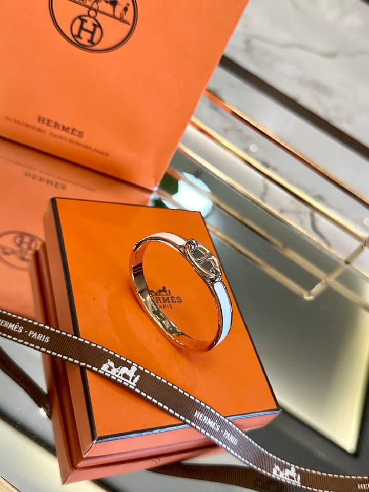 Hermès Pig Nose Enamel Bracelet in Gold
