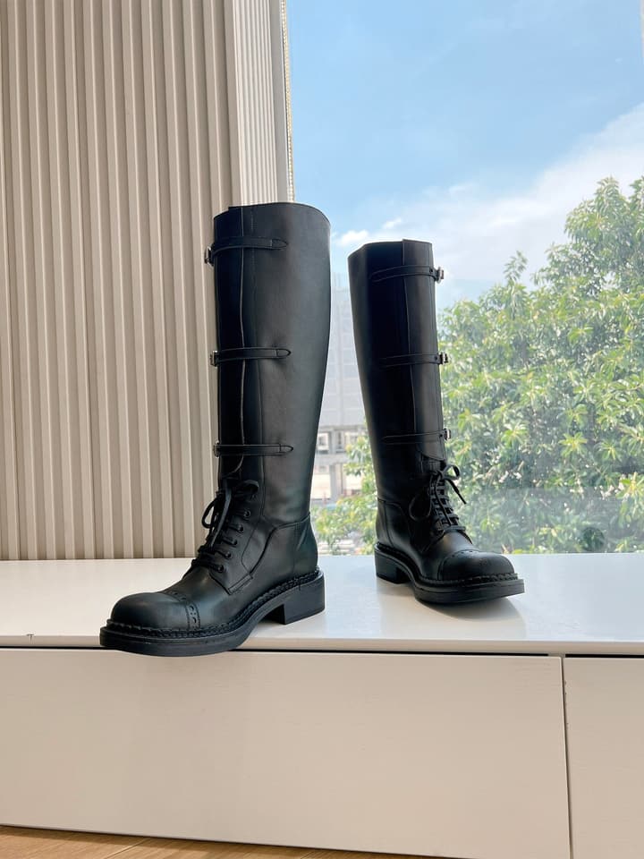 Miu Miu Distressed Biker Knee-High Boots – Autumn/Winter Runway Edition in Distressed Black Moto Boots