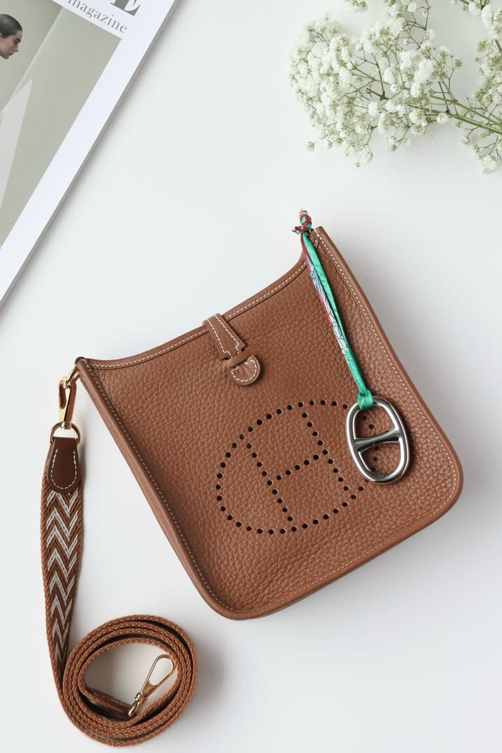 Hermès Mini Evelyne TPM – Gold Brown in Gold Brown With Patterned Strap