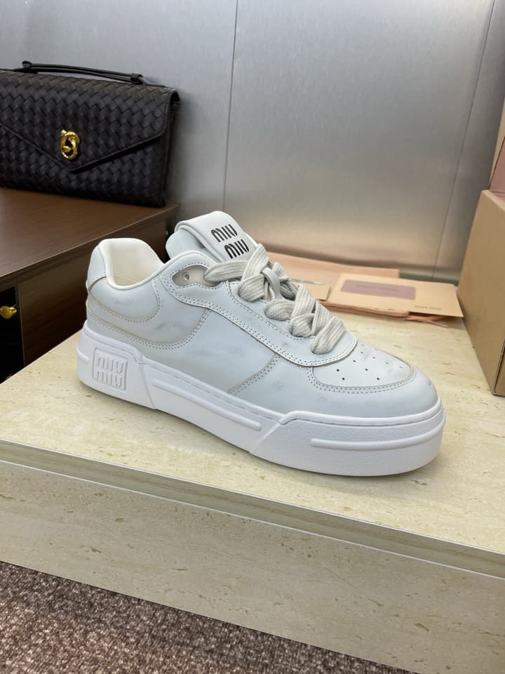 Miu Miu 2025FW Runway Lace-Up Casual Sneakers – 2025FW in Distressed Off-white Sneaker