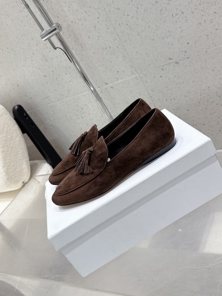 The Row Tassel Loafers in Black Suede