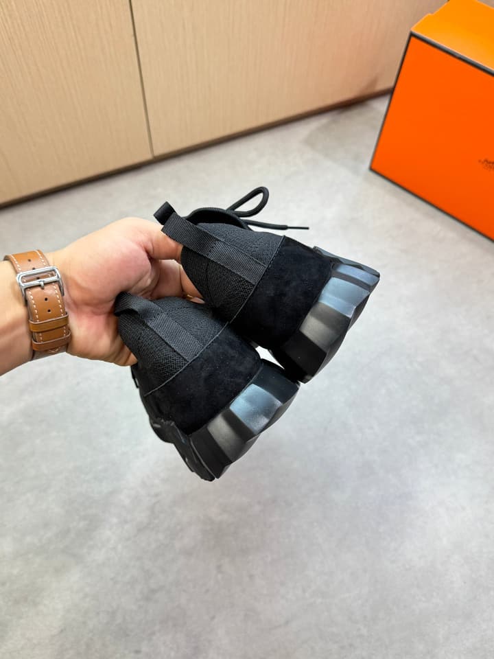 Hermès Casual Sports Sneakers in Black With White Laces And Orange Sole