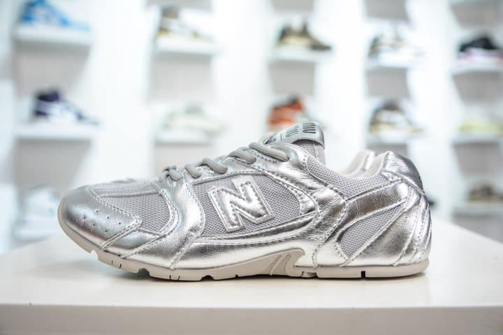 Miu Miu x New Balance MR530 SL Distressed Sneakers in Beige