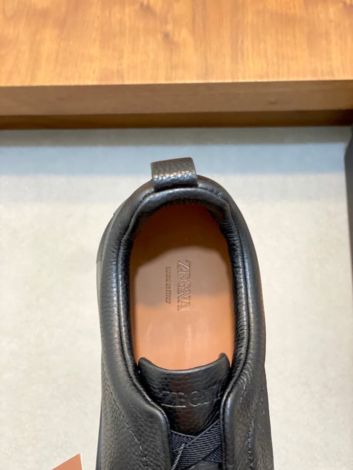 Ermenegildo Zegna Triple Stitch Sneakers in Black Leather With Brown Tag