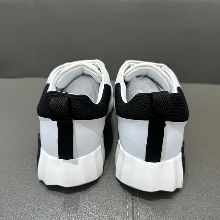 Hermès Bouncing Tech Mesh Sneakers in Black And White