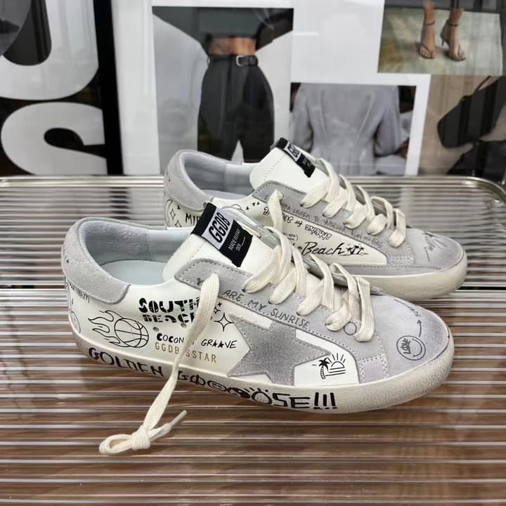 Golden Goose Classic Distressed Sneakers in Tan Suede With White Laces