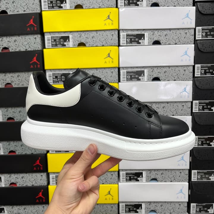 Alexander McQueen Oversized Low-Top Sneakers in All Black With White Sole