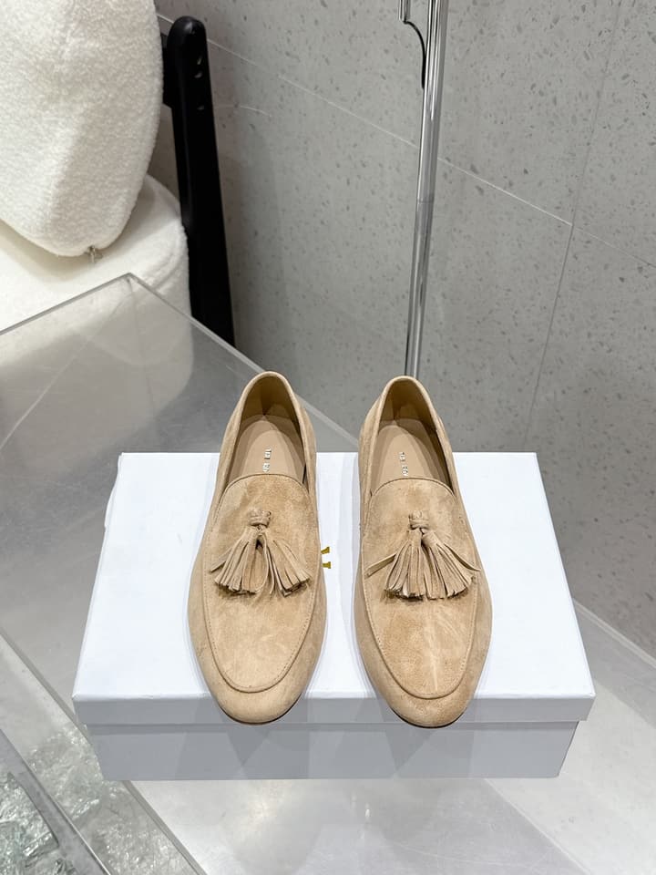 The Row Tassel Loafers in Black Suede