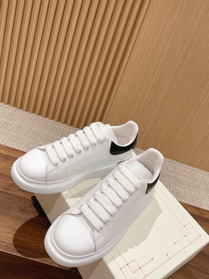 Alexander McQueen Classic Versatile White Sneakers in White With Black Laces & Heel