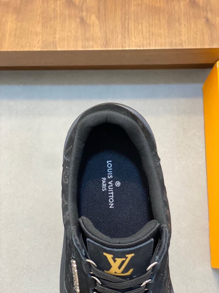 Louis Vuitton Embossed Calfskin Sneakers in Black