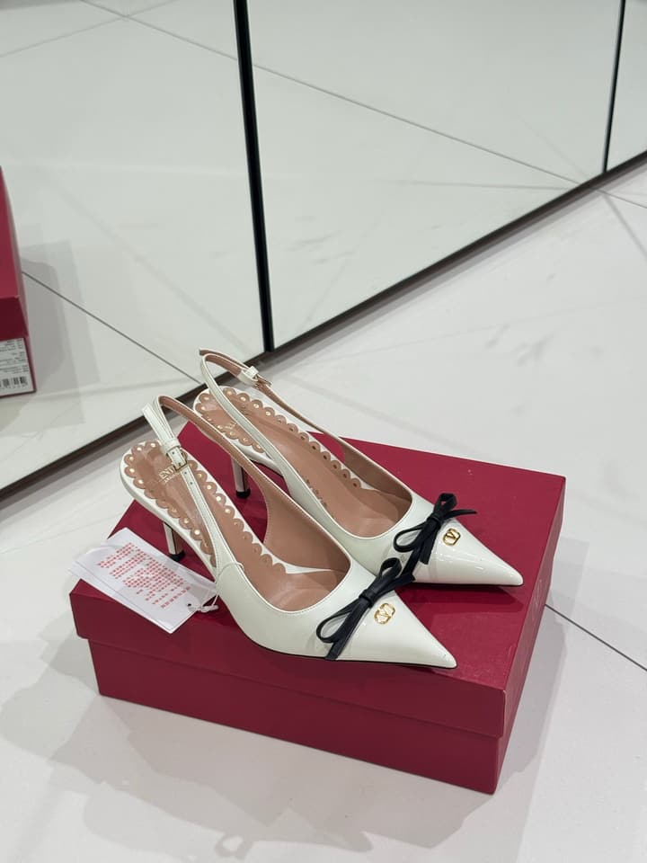 Valentino Bow-Detail High Heels in Black With White Bow