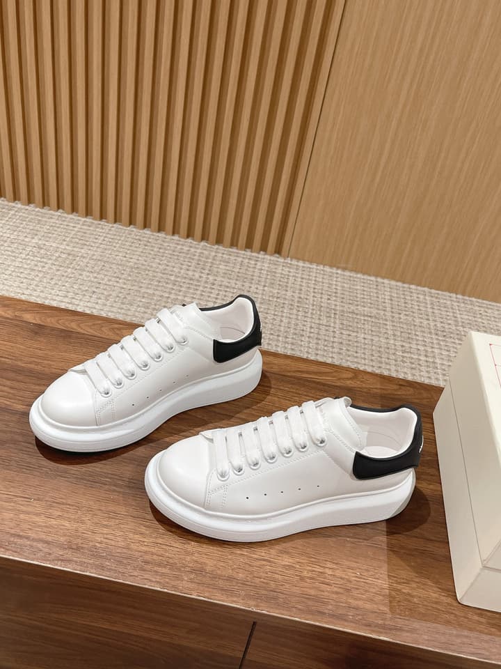 Alexander McQueen Classic Versatile White Sneakers in White With Black Laces & Heel