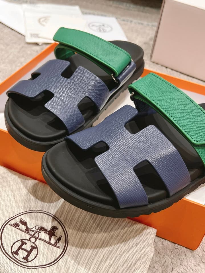 Hermès Chypre Suede Unisex Slides in Black With Dark Blue Strap