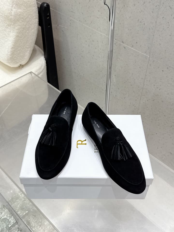 The Row Tassel Loafers in Black Suede