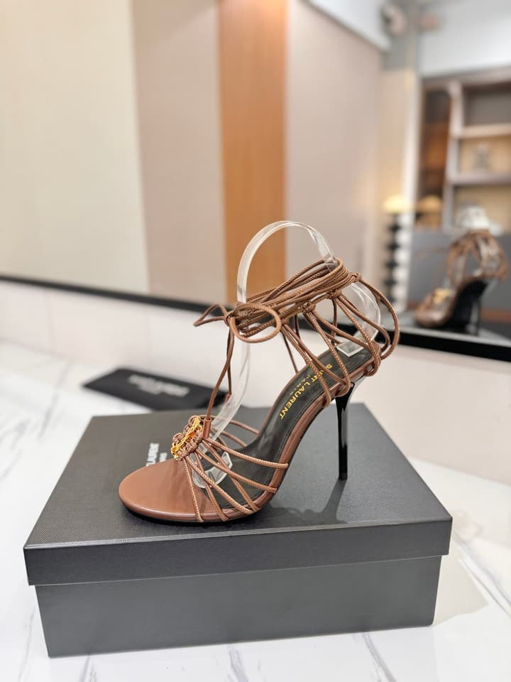 Saint Laurent Letter Buckle Pumps in Bright Gold